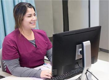 MA Student Working On The Computer